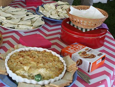 A recent spread of tea sandwiches, dip, and melba toast at the Garden Club of East Hampton’s plant sale found its color in the table cloth.