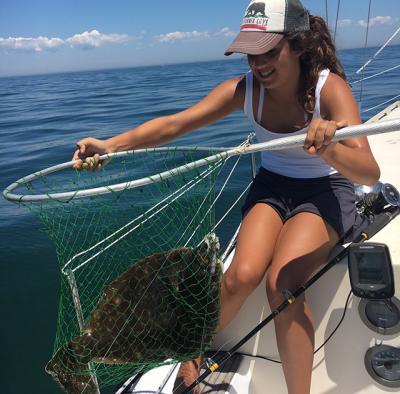 Anni Spacek, 13, caught a nine-pound fluke by the Shagwong buoy this week.