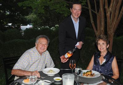 Michael Cohen, restaurant manager and sommelier at the 1770 House in East Hampton, poured a bottle of rosé for customers in the restaurant’s garden. Michael Cohen, restaurant manager and sommelier at the 1770 House in East Hampton, poured a bottle of rosé for customers in the restaurant’s garden.