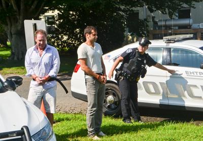 Chris W. Layton, left, and Sahm Adrangi, center, appeared in East Hampton Town Justice Court on Saturday following their drunken-driving arrests. Chris W. Layton, left, and Sahm Adrangi, center, appeared in East Hampton Town Justice Court on Saturday following their drunken-driving arrests.