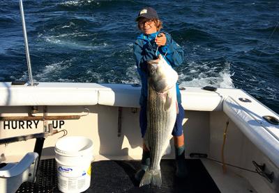 Bennett Burki, 10, caught a 35-pound striped bass off Montauk Point. Bennett Burki, 10, caught a 35-pound striped bass off Montauk Point.