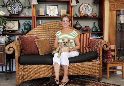 Marcia Previti, whose garden is a series of rooms enlivened by her architectural background and sculptures, below, sat at home with her dog, Dallas, on a recent afternoon. Marcia Previti, whose garden is a series of rooms enlivened by her architectural background and sculptures, below, sat at home with her dog, Dallas, on a recent afternoon.
