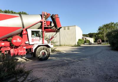 A cement truck pulled out of an industrial site in Wainscott on Tuesday in a commercial area that would be subject to a one-year building moratorium while East Hampton Town completes a planning study. A cement truck pulled out of an industrial site in Wainscott on Tuesday in a commercial area that would be subject to a one-year building moratorium while East Hampton Town completes a planning study.