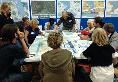 In one of a series of meetings in Montauk last week, planners consulting with the town on a hamlet study focusing on commercial properties gathered to study maps and come up with priorities for the future of the hamlet’s downtown and dock areas. In one of a series of meetings in Montauk last week, planners consulting with the town on a hamlet study focusing on commercial properties gathered to study maps and come up with priorities for the future of the hamlet’s downtown and dock areas.