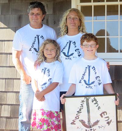 Andy White, his parents, Lee and Mary Jo White, and his sister, Jolee, wore T-shirts made from a painting he did in first grade.