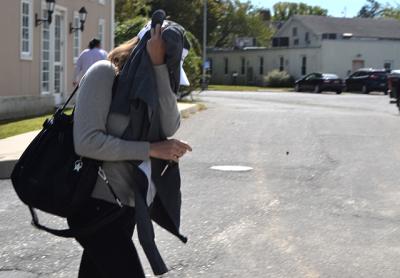 Alina Gersham, the alleged organizer of an illegal Montauk share house left East Hampton Town Justice Court Monday after being arraigned and posting $5,000 bail. Alina Gersham, the alleged organizer of an illegal Montauk share house left East Hampton Town Justice Court Monday after being arraigned and posting $5,000 bail.