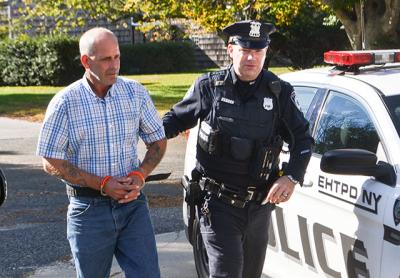 Dennis E. McGuire of East Hampton was arrested Monday by town police on a felony charge stemming from an incident Saturday in which he allegedly videoed a young woman showering in his home on Oakview Highway. Dennis E. McGuire of East Hampton was arrested Monday by town police on a felony charge stemming from an incident Saturday in which he allegedly videoed a young woman showering in his home on Oakview Highway.