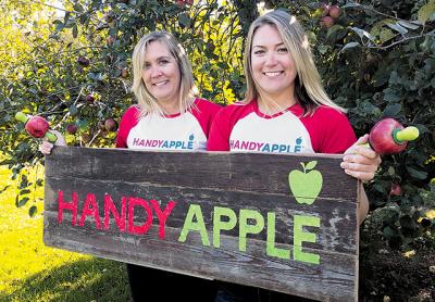 Debbie Blake-Frasca and her daughter, Megan Morici, invented the Handy Apple, an apple holder for children. Debbie Blake-Frasca and her daughter, Megan Morici, invented the Handy Apple, an apple holder for children.