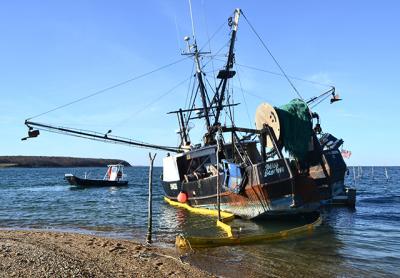 On Monday a boom was placed around the Miss Scarlett to contain any potential oil leaks; the oil was pumped out by the end of the day Tuesday. On Monday a boom was placed around the Miss Scarlett to contain any potential oil leaks; the oil was pumped out by the end of the day Tuesday.