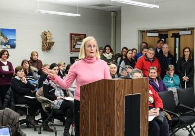 Encie Peters, a resident of Cedar Street in East Hampton, was one of more than 50 people who attended the East Hampton School Board meeting on Tuesday to voice their objections to a proposed bus depot on Cedar Street.