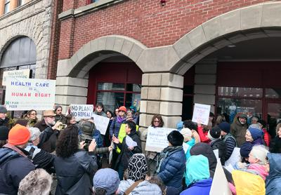 Constituents rallied outside Representative Lee Zeldin’s office in Riverhead on Tuesday. Constituents rallied outside Representative Lee Zeldin’s office in Riverhead on Tuesday.