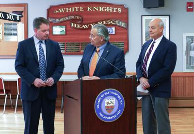 Chief Gerard Larsen of the East Hampton Village Police Department, left, who is retiring, was thanked for his service by Mayor Paul F. Rickenbach Jr. and Richard Lawler, the police commissioner and a member of the village board. Chief Gerard Larsen of the East Hampton Village Police Department, left, who is retiring, was thanked for his service by Mayor Paul F. Rickenbach Jr. and Richard Lawler, the police commissioner and a member of the village board.