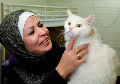 The story of how Sura, an Iraqi refugee, was reunited with her cat, Kunkush, in Norway months after fleeing Mosul is told in a new picture book co-written by those involved in the extraordinary effort. The story of how Sura, an Iraqi refugee, was reunited with her cat, Kunkush, in Norway months after fleeing Mosul is told in a new picture book co-written by those involved in the extraordinary effort.