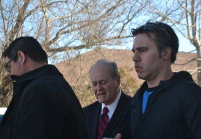 Robert Andrade, right, left East Hampton Town Justice Court last Thursday after he was arraigned on four misdemeanor charges related to an alleged under-age party house in Springs. Robert Andrade, right, left East Hampton Town Justice Court last Thursday after he was arraigned on four misdemeanor charges related to an alleged under-age party house in Springs.
