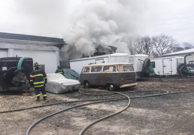 A fire broke out Tuesday morning in a bay of a commercial building that was rented out by a landscaping company. A fire broke out Tuesday morning in a bay of a commercial building that was rented out by a landscaping company.