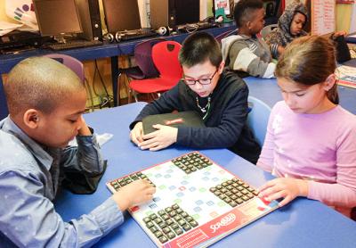 How many words can you make from 25 random tiles? Mikhail Feaster, left, Carlos Carmona, center, and Jasmin DelGiorno ponder the challenge at the Bridgehampton Child Care and Recreation Center. How many words can you make from 25 random tiles? Mikhail Feaster, left, Carlos Carmona, center, and Jasmin DelGiorno ponder the challenge at the Bridgehampton Child Care and Recreation Center.