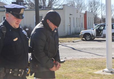 Jefferson Davis Eames was led into East Hampton Town Justice Court last Thursday afternoon for his arraignment on a felony charge of grand larceny. Jefferson Davis Eames was led into East Hampton Town Justice Court last Thursday afternoon for his arraignment on a felony charge of grand larceny.