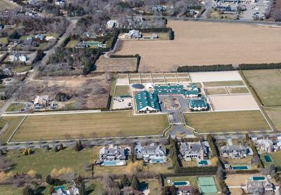 Neighbors are not happy with the size of Campbell Stables in Bridgehampton, but the issue before the Southampton Town Planning Board is whether to legalize a service road and structure with a horse walker already there and whether to allow the owners to add more horses and a temporary tent in the summer. Neighbors are not happy with the size of Campbell Stables in Bridgehampton, but the issue before the Southampton Town Planning Board is whether to legalize a service road and structure with a horse walker already there and whether to allow the owners to add more horses and a temporary tent in the summer.