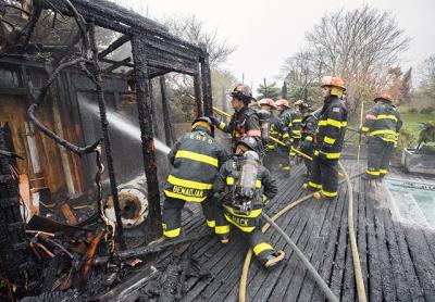 A pool house on a Georgica Road property was destroyed by flames on Tuesday. Fire officials said it had been burning a while before a passerby noticed. A pool house on a Georgica Road property was destroyed by flames on Tuesday. Fire officials said it had been burning a while before a passerby noticed.