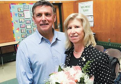 Debra Winter, the new superintendent of the Springs School District, with her husband at the school last Wednesday