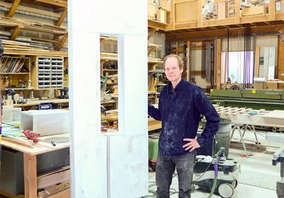 Mark Webber’s work in progress, seen here in his woodworking studio in Wainscott, is the largest of his signature “portals.” Mark Webber’s work in progress, seen here in his woodworking studio in Wainscott, is the largest of his signature “portals.”
