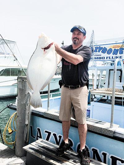 John Lombardo of Poughkeepsie, N.Y., landed this nine-pound fluke on the Lazybones on Sunday morning. It was, by all accounts, the largest fluke landed so far this season out of Montauk. John Lombardo of Poughkeepsie, N.Y., landed this nine-pound fluke on the Lazybones on Sunday morning. It was, by all accounts, the largest fluke landed so far this season out of Montauk.