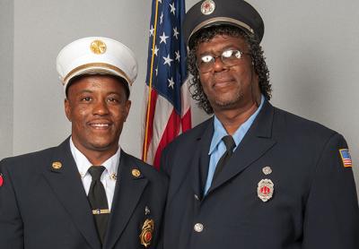 Jamalia Hayes, the East Hampton Fire Department’s second assistant chief, at left, followed in the footsteps of his father, Dudley Hayes, by joining the department in 2005.