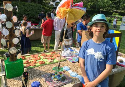 Beckham LaRose of the Sag Harbor Elementary School collaborated with Georgi Mesnick, a fellow fifth grader (not pictured), on a magnetic kinetic sculpture that took first place in the collaborative sculpture category at the LongHouse Reserve’s Student Annual on Tuesday.