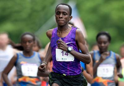 Edwin Kipsang Rotich set course records through the first four miles. Edwin Kipsang Rotich set course records through the first four miles.