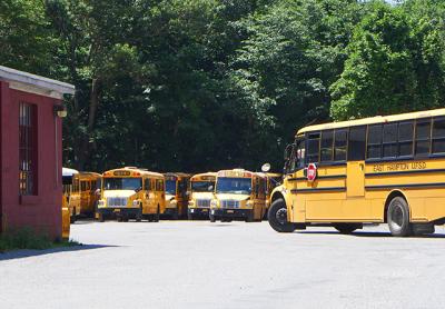 The East Hampton School District’s five-year lease on the bus depot property on Route 114, above, is considered a “stopgap measure” while the district plans for a long-term solution.