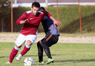 Try as they might, John Romero Jr. and his Maidstone Market teammates could do nothing against Hampton F.C.-Bill Miller on June 14. Bill Miller won the game 4-1. Try as they might, John Romero Jr. and his Maidstone Market teammates could do nothing against Hampton F.C.-Bill Miller on June 14. Bill Miller won the game 4-1.