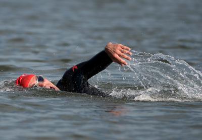 Michael Petrzela was again first out of the water in Fighting Chance’s longest swim, a 2-miler this time.