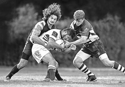 Axel Alanis (with the ball) prefers rugby’s constant flow to football. Axel Alanis (with the ball) prefers rugby’s constant flow to football.