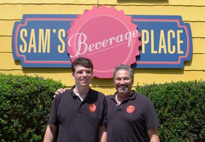 Sam Iden, left, and his father, Mitchell Iden, opened Sam's Beverage Place last week in the former Pritam and Eames furniture store on Race Lane in East Hampton.