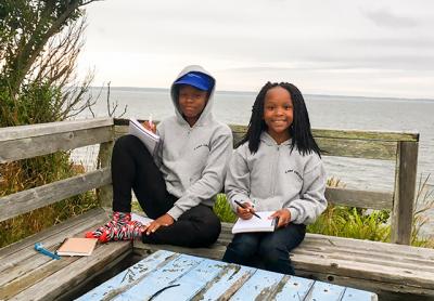 Shiaasia, left, and Precious live together in a foster home in Queens. For 10 days in July they attend Camp Erutan in Springs, with other children in foster care.