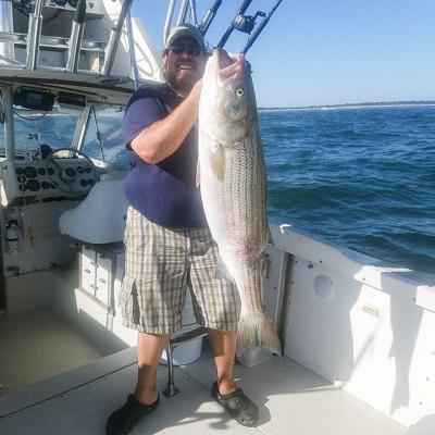 Sam Doughty of East Hampton caught this 37-pound striped bass on Sunday during the Montauk Mercury Grand Slam Tournament.