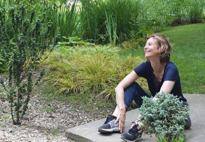 Toni Ross paused for a moment during the installation of her work at the LongHouse Reserve in East Hampton this spring to enjoy the atmosphere “and one of the happiest bird sanctuaries in the world,” she said.	Below, Jack Lenor Larsen and Toni Ross enjoyed a golf cart ride around the grounds of the LongHouse Reserve.