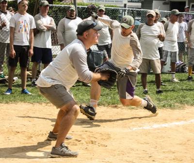 David Baer, a former Star intern, has anchored the Writers team in recent years. Above, he made for home in the Scribes’ 9-6 win last year. David Baer, a former Star intern, has anchored the Writers team in recent years. Above, he made for home in the Scribes’ 9-6 win last year.