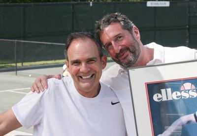 Paul Annacone, left, said if Scott Rubenstein, E.H.I.T.’s managing partner, had availed himself 30 years ago of the advice in “Coaching for Life,” he would have defeated him in shuffleboard at Orange Lake.