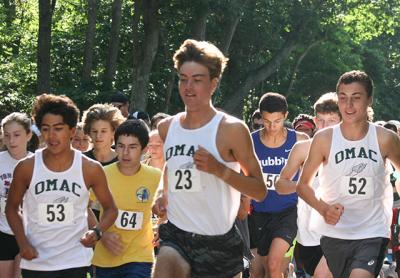 Ryan Fowkes, East Hampton High School’s top cross-country runner, won Labor Day’s Great Bonac 5K in Springs, in 17 minutes and 31 seconds. A teammate of his, Geo Espinoza, below, was the runner-up. Ryan Fowkes, East Hampton High School’s top cross-country runner, won Labor Day’s Great Bonac 5K in Springs, in 17 minutes and 31 seconds. A teammate of his, Geo Espinoza, below, was the runner-up.