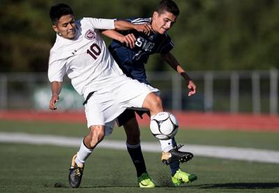 Justin Carpio (10) assisted on Wilmur Guzman’s game-tying header in the second half of the game here with Amityville. Justin Carpio (10) assisted on Wilmur Guzman’s game-tying header in the second half of the game here with Amityville.