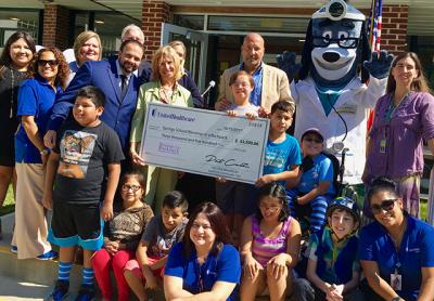 Representatives from United Healthcare presented the Springs School with a check for $3,500 to officially launch the Springs chapter of Blessings in a Backpack, which helps feed schoolchildren on weekends. Representatives from United Healthcare presented the Springs School with a check for $3,500 to officially launch the Springs chapter of Blessings in a Backpack, which helps feed schoolchildren on weekends.