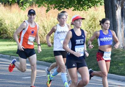 Barbara Gubbins (in the white singlet) was to finish third over all among the women, even though she’s 57. Barbara Gubbins (in the white singlet) was to finish third over all among the women, even though she’s 57.