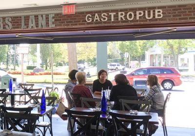 The Job’s Lane Gastro Pub in Southampton opens its doors to the street and Agawam Park on warm days.