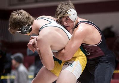 Andreas Koutsogiannis, at right, was an East Hampton champion in Saturday’s Sprig Gardner tournament at 195 pounds. Andreas Koutsogiannis, at right, was an East Hampton champion in Saturday’s Sprig Gardner tournament at 195 pounds.