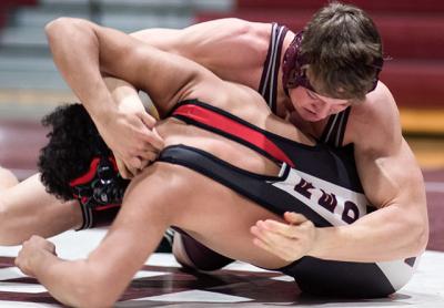 Anthony Franzone, wrestling at 160 pounds, won by pin 16 seconds into the second period in Friday’s match here with East Islip. Anthony Franzone, wrestling at 160 pounds, won by pin 16 seconds into the second period in Friday’s match here with East Islip.