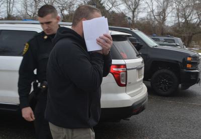 Ned Wessels, 31, was taken from Suffolk County jail to East Hampton Town Justice Court last Thursday to be arraigned on burglary charges stemming from an incident in East Hampton Village last April. Ned Wessels, 31, was taken from Suffolk County jail to East Hampton Town Justice Court last Thursday to be arraigned on burglary charges stemming from an incident in East Hampton Village last April.