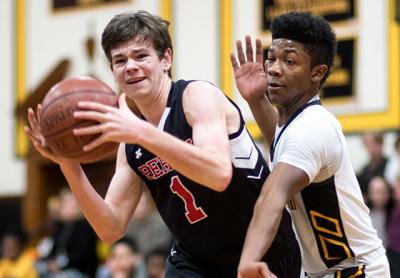 Elijah White, guarding Pierson’s Tom Brooks above, wound up with a game-high 27 points in the 63-61 loss. The Bees would probably have won had they not gone 2-for-8 from the foul line in the final 1:19. Elijah White, guarding Pierson’s Tom Brooks above, wound up with a game-high 27 points in the 63-61 loss. The Bees would probably have won had they not gone 2-for-8 from the foul line in the final 1:19.