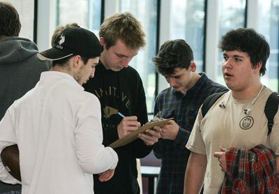 The Jan. 24 meeting in the high school's cafeteria drew 24 prospective football players, each of whom was asked to recruit a friend or two. The Jan. 24 meeting in the high school's cafeteria drew 24 prospective football players, each of whom was asked to recruit a friend or two.