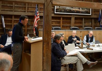 Rick Drew, left, spoke at Monday's meeting of the East Hampton Town Trustees about an increased wish-list for donations from the company planning an offshore wind turbine project that would generate up to TK megawatts of electricity. <I>Chris Walsh<P> Rick Drew, left, spoke at Monday's meeting of the East Hampton Town Trustees about an increased wish-list for donations from the company planning an offshore wind turbine project that would generate up to TK megawatts of electricity. <I>Chris Walsh<P>